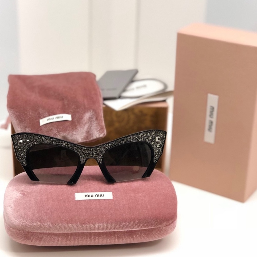 MIU MIU Cut Off Cat Eye Sunglasses.
